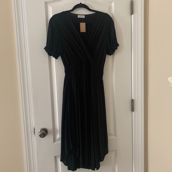 vestique Dresses & Skirts - Vestique “Keep Smiling” black dress